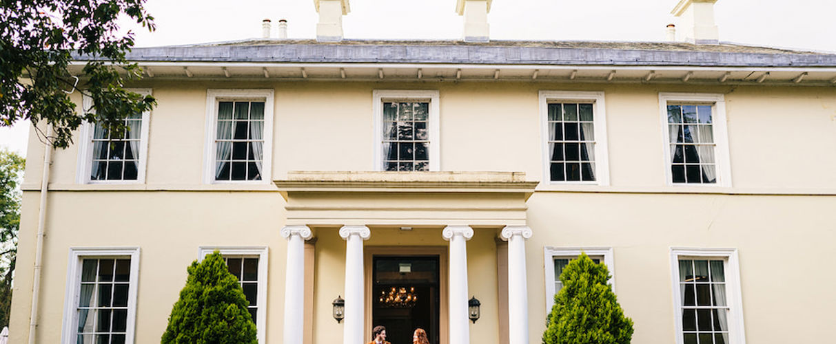 bride and groom outside Eastwood Hall