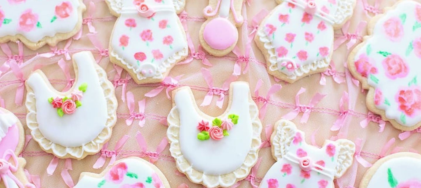 baby shower cookies with pink icing