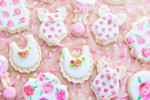 baby shower cookies with pink icing