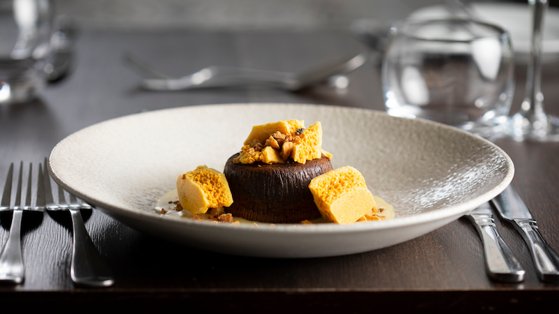 Chocolate dessert with honeycomb pieces