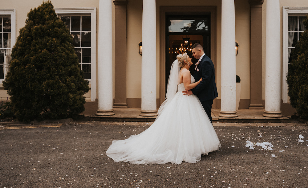 Bride and Groom outside Eastwood Hall manor house in Nottinghamshire